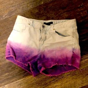 I’m selling Jean shorts with purple on the bottom